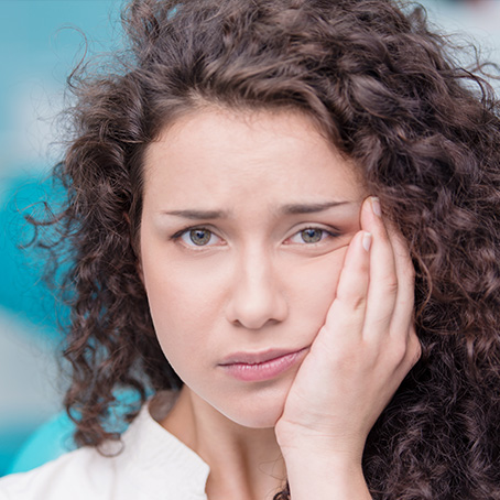 woman with mouth pain