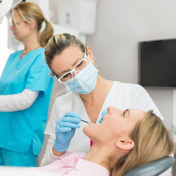 woman receiving a dental exam